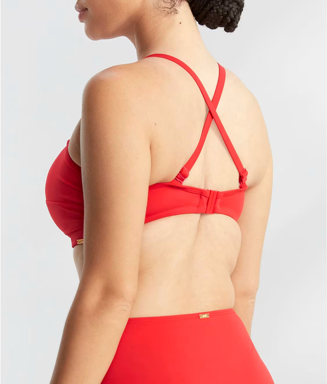 Red bikini set on a plain background